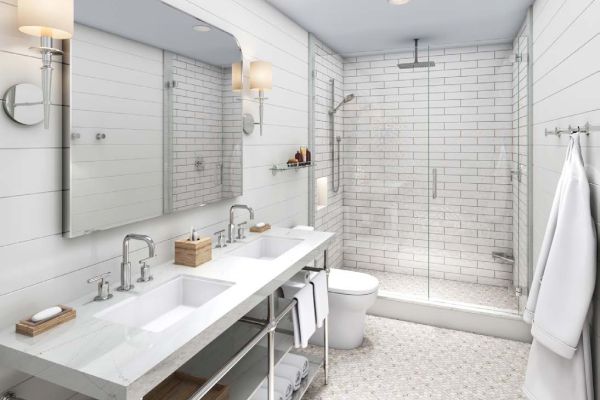 Modern bathroom with double sinks, large mirror, glass-enclosed shower, white tiles, and towels on shelves. The decor is clean and minimalistic.